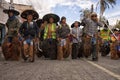 Indigenous quechua men wearing costumes in Ecuador