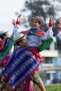 Indigenous quechua people dancing outdoors