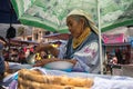 Indigenous quechua woman in Otavalo Ecuador farmers market