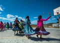 Indigenous school student group dance in traditional colorful dress on playground, Mexico, America Royalty Free Stock Photo
