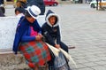 Indigenous woman from Ecuador and making panama hat