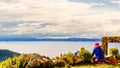 Indigenous woman on isla del sol by lake titicaca - Bolivia Royalty Free Stock Photo