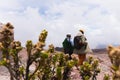 Indigenous woman with a young traveler in the mountains. Ecuador, the Andes. Royalty Free Stock Photo