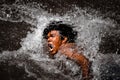 Indigenous young man swimming in the Indigenous Games 2009