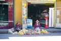 Indigent Indio farmer women sell their fruit and vegetables on the streets of Huaraz