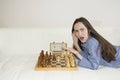 The indignant woman is playing chess, where the partner. Royalty Free Stock Photo