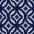 Indigo blue batik dyed effect circle texture background. Seamless japanese style repeat pattern swatch. Painterly leaf Royalty Free Stock Photo