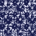 Indigo blue woven boro cotton dyed effect texture background. Seamless japanese repeat batik pattern swatch. Daisy motif