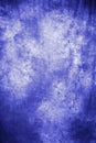 Indigo sapphirine fabric artistic background with simulated blurred ink.