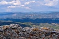 Indistinct old stone wall against the background of a landscape