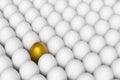Individiuality and difference concept.Standing golden egg in between common eggs. Royalty Free Stock Photo