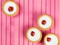Individual Bakewell Tarts On A Pink Background Royalty Free Stock Photo
