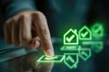 Person interacting with futuristic virtual touchscreen selecting home verification options with glowing green check marks Royalty Free Stock Photo
