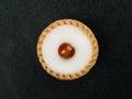 Individual Iced Bakewell Tart Topped With a Cherry