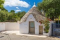 Individual inhabited trullo house, Alberobello town, Apulia region, Southern Italy Royalty Free Stock Photo