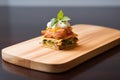 individual lasagna portion on a wooden board Royalty Free Stock Photo