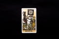 An individual major arcana tarot card isolated on black background. Death.