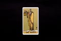 An individual major arcana tarot card isolated on black background. The Hermit. Royalty Free Stock Photo