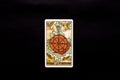 An individual major arcana tarot card isolated on black background. Wheel of fortune.