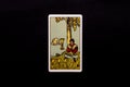 An individual minor arcana tarot card isolated on black background. Four of cups. Royalty Free Stock Photo