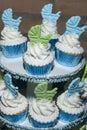 Individual Presentation Cupcakes Decorated With Whipped Cream Baby Shower Theme