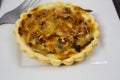 Individual quiche with onions