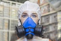 Individual respirator for respiratory protection from harmful substances mounted on a mannequin. Construction, medicine, virus 