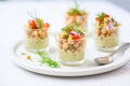 individual servings of chickpea salad in small cups