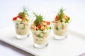 individual servings of chickpea salad in small cups