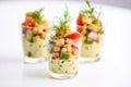 individual servings of chickpea salad in small cups