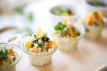 individual servings of couscous salad in small cups