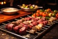 individual skewering different meats for brazilian bbq