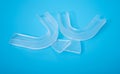 Individual teeth tray for whitening on blue background