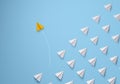 Individual and unique leader yellow paper plane changing direction. Individuality concept. Think different Royalty Free Stock Photo