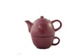 Maroon ceramic teapot on white background