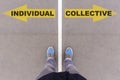 Individual vs Collective text arrows on asphalt ground, feet and Royalty Free Stock Photo