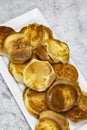 Individual Yorkshire puddings on a white rectangular plate. Traditional British food Royalty Free Stock Photo