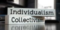 Individualism, collectivism - words on wooden blocks Royalty Free Stock Photo