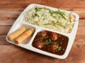 Indo chinese veg combo meal - consists of veg pulav, veg manchurian and spring rolls. selective focus Royalty Free Stock Photo