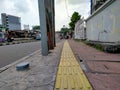 Indomaret, Roxy mas, Jakarta, IndoSidewalks with signposts for the visually impaired with a yellow line