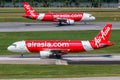 Indonesia AirAsia Airbus A320 airplanes at Changi Airport in Singapore