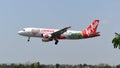 Indonesia AirAsia, Lombok livery, seconds to land at Adi Soemarmo Airport (Boyolali, Indonesia: November 9, 2019)
