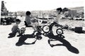 INDONESIA, BALI - AUGUST 2014: A group of unidentified children is playing on their bike. Children from undeveloped countries live