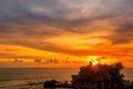 Sunset over the Ocean and Temple on the Island Royalty Free Stock Photo