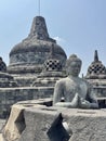 Statue of Buddha standing in Borobudur Buddhist Temple in Central Java, Indonesia Royalty Free Stock Photo