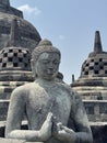 Statue of Buddha standing in Borobudur Buddhist Temple in Central Java, Indonesia Royalty Free Stock Photo