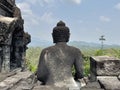 Statue of Buddha standing in Borobudur Buddhist Temple in Central Java, Indonesia Royalty Free Stock Photo