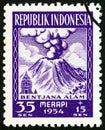 INDONESIA - CIRCA 1954: A stamp printed in Indonesia shows Merapi Volcano in eruption, circa 1954.