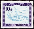 INDONESIA - CIRCA 1947: A stamp printed in Indonesia shows aircraft and map of Indonesia, circa 1947.