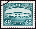 INDONESIA - CIRCA 1953: A stamp printed in Indonesia shows Bandung Post Office, circa 1953.